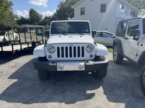 Another view of 2015 JEEP WRANGLER UNLIMI SAHARA for sale in Camby, IN at Mr. Care Auto