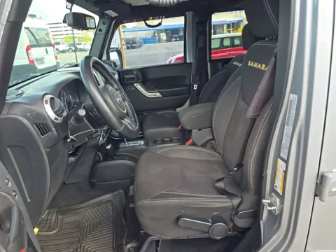 Another view of 2015 Jeep Wrangler Unlimited Sahara for sale in St. Charles, MO at Clement Supercenter