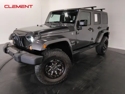 Gray 2016 Jeep Wrangler Unlimited Sahara for sale in St. Charles, MO