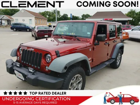 Red 2014 Jeep Wrangler Unlimited Sahara for sale in Florissant, MO