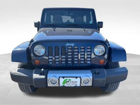 Photos of 2013 Jeep Wrangler Unlimited Sahara for sale in Berlin, NJ at Bridge Auto Group