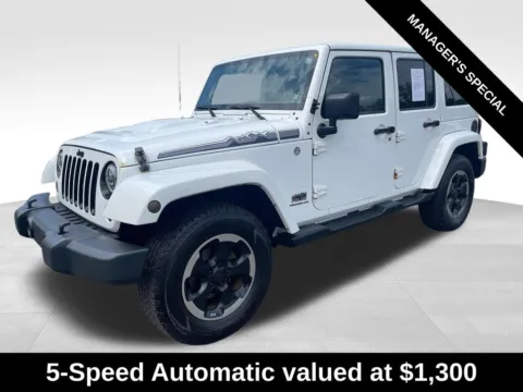 Another view of 2014 Jeep Wrangler Unlimited Sahara for sale in Berlin, NJ at Bridge Auto Group