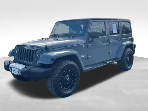Another view of 2014 Jeep Wrangler Unlimited Sahara for sale in Berlin, NJ at Bridge Auto Group