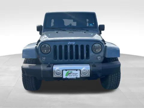 Photos of 2014 Jeep Wrangler Unlimited Sahara for sale in Berlin, NJ at Bridge Auto Group