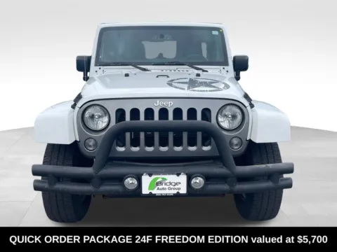 Photos of 2015 Jeep Wrangler Unlimited Freedom Edition for sale in Berlin, NJ at Bridge Auto Group