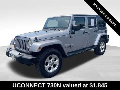 Another view of 2013 Jeep Wrangler Unlimited Sahara for sale in Berlin, NJ at Bridge Auto Group