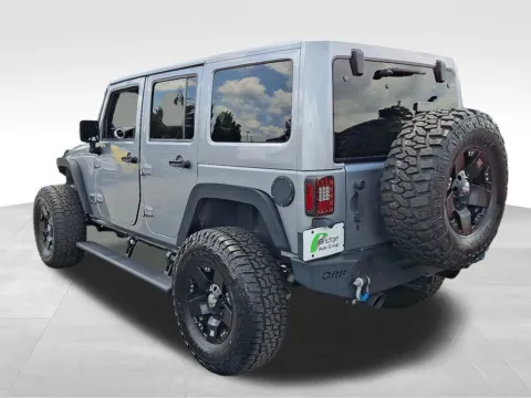 More photos of 2014 Jeep Wrangler Unlimited Altitude at Bridge Auto Group, NJ