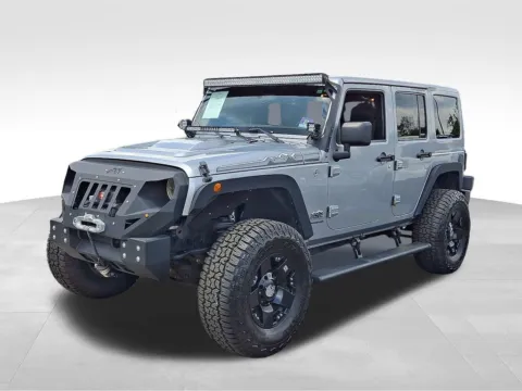 Another view of 2014 Jeep Wrangler Unlimited Altitude for sale in Berlin, NJ at Bridge Auto Group