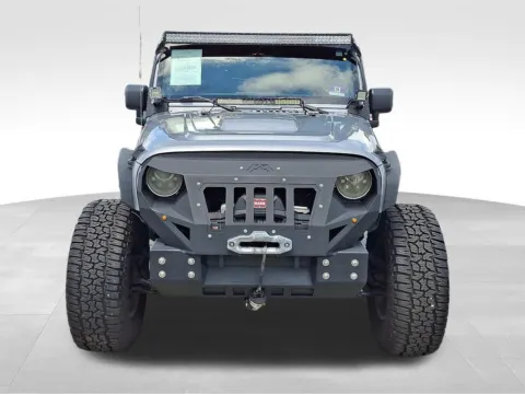 Photos of 2014 Jeep Wrangler Unlimited Altitude for sale in Berlin, NJ at Bridge Auto Group