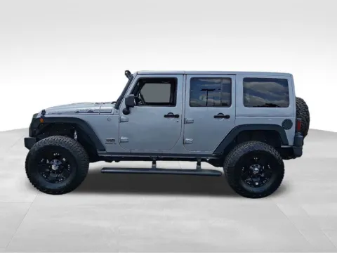 More photos of 2014 Jeep Wrangler Unlimited Altitude at Bridge Auto Group, NJ