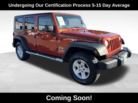 Orange 2009 Jeep Wrangler Unlimited X for sale in Berlin, NJ