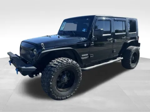 Another view of 2014 Jeep Wrangler Unlimited Sport for sale in Berlin, NJ at Bridge Auto Group