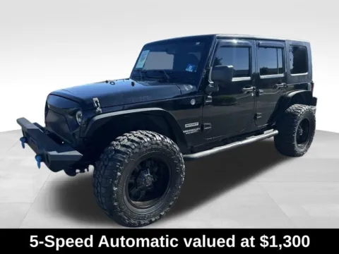 Another view of 2014 Jeep Wrangler Unlimited Sport for sale in Berlin, NJ at Bridge Auto Group
