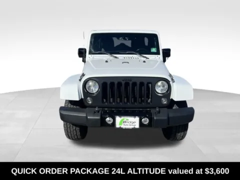 Photos of 2014 Jeep Wrangler Unlimited Altitude for sale in Berlin, NJ at Bridge Auto Group