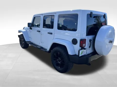 Another view of 2014 Jeep Wrangler Unlimited Altitude for sale in Berlin, NJ at Bridge Auto Group