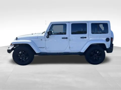 Photos of 2014 Jeep Wrangler Unlimited Altitude for sale in Berlin, NJ at Bridge Auto Group