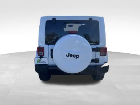 More photos of 2014 Jeep Wrangler Unlimited Altitude at Bridge Auto Group, NJ