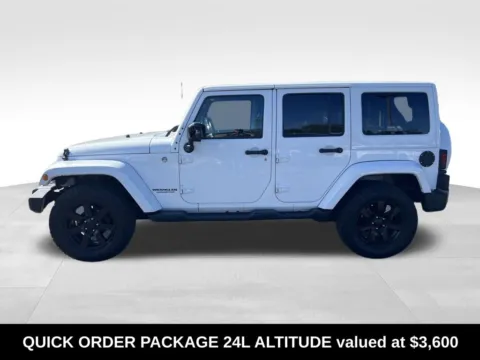 Photos of 2014 Jeep Wrangler Unlimited Altitude for sale in Berlin, NJ at Bridge Auto Group