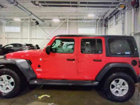Photos of 2019 Jeep Wrangler Unlimited Sport S for sale in Nashua, NH at CarFive Nashua, NH
