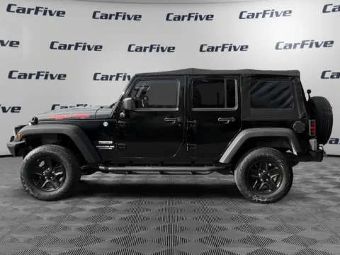 Photos of 2013 Jeep Wrangler Unlimited Sport for sale in Nashua, NH at CarFive Nashua, NH