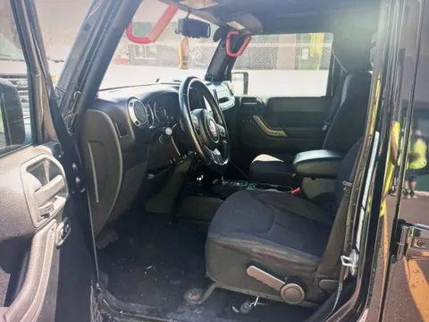 More photos of 2013 Jeep Wrangler Unlimited Sport at CarFive Nashua, NH, NH