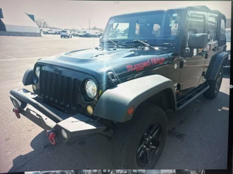 Black 2013 Jeep Wrangler Unlimited Sport for sale in Nashua, NH