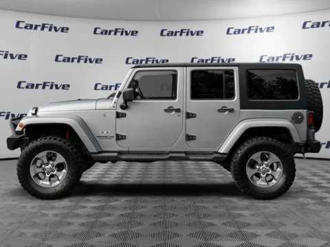 Photos of 2016 Jeep Wrangler Unlimited Sahara for sale in Nashua, NH at CarFive Nashua, NH