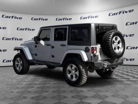 Another view of 2016 Jeep Wrangler Unlimited Sahara for sale in Nashua, NH at CarFive Nashua, NH