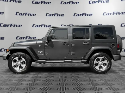 Photos of 2018 Jeep Wrangler JK Unlimited Sahara for sale in Nashua, NH at CarFive Nashua, NH