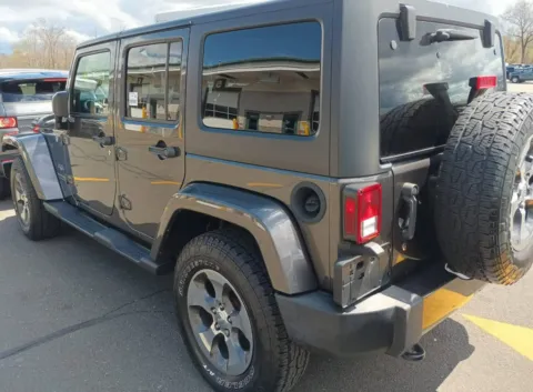 Another view of 2018 Jeep Wrangler JK Unlimited Sahara for sale in Nashua, NH at CarFive Nashua, NH