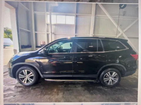 Photos of 2016 Honda Pilot EX-L for sale in Nashua, NH at CarFive Nashua, NH