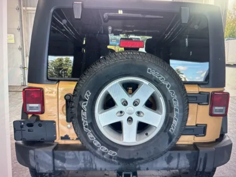 Another view of 2014 Jeep Wrangler Unlimited Sport for sale in Nashua, NH at CarFive Nashua, NH
