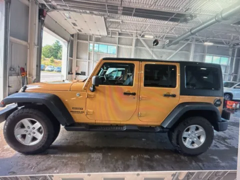Photos of 2014 Jeep Wrangler Unlimited Sport for sale in Nashua, NH at CarFive Nashua, NH