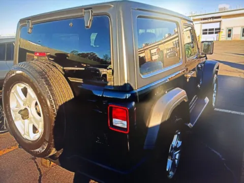 Photos of 2019 Jeep Wrangler Sport S for sale in Nashua, NH at CarFive Nashua, NH