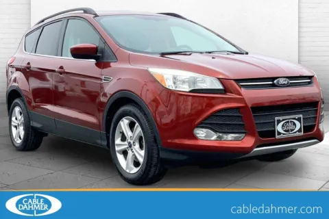 Orange 2014 Ford Escape SE for sale in Independence, MO