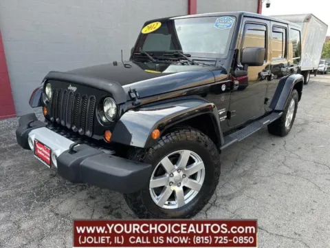 Black 2012 Jeep Wrangler Unlimited Sahara for sale in Joliet, IL