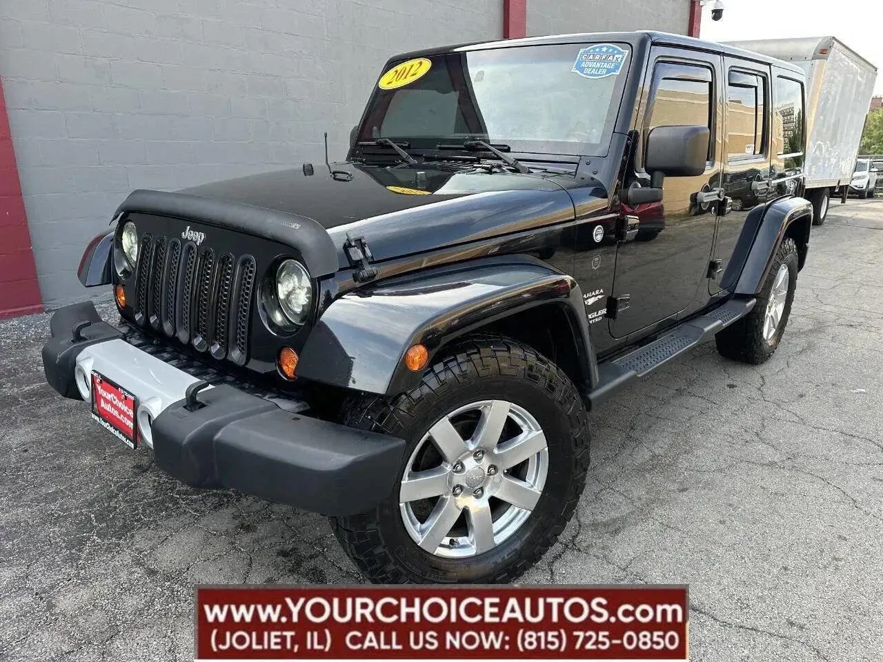 Black 2012 Jeep Wrangler Unlimited Sahara for sale in Joliet, IL