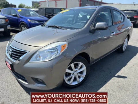 Silver 2014 Nissan Versa SL for sale in Joliet, IL