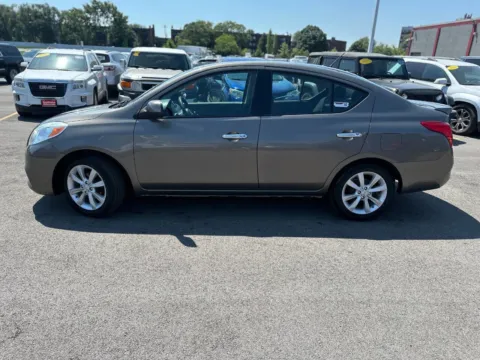 Photos of 2014 Nissan Versa SL for sale in Joliet, IL at Your Choice Autos - Joliet