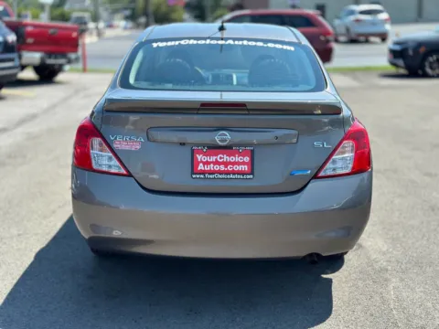 More photos of 2014 Nissan Versa SL at Your Choice Autos - Joliet, IL