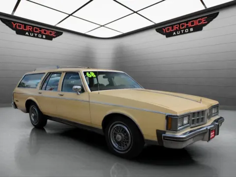 Another view of 1986 Oldsmobile Custom Cruiser Base 4dr Wagon for sale in Elgin, IL at Your Choice Autos - Elgin