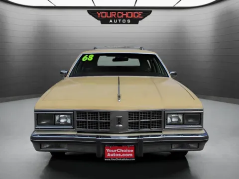 Photos of 1986 Oldsmobile Custom Cruiser Base 4dr Wagon for sale in Elgin, IL at Your Choice Autos - Elgin