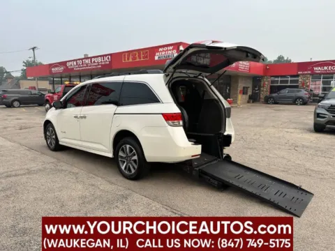 Another view of 2016 Honda Odyssey Touring Elite 4dr Mini Van for sale in Waukegan, IL at Your Choice Autos - Waukegan