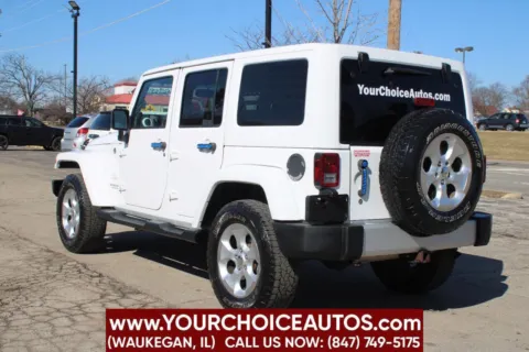 More photos of 2014 Jeep Wrangler Unlimited Sahara at Your Choice Autos - Waukegan, IL
