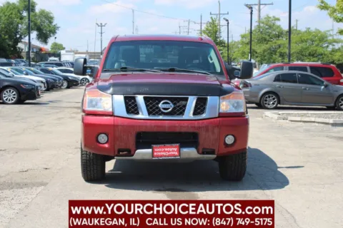 Photos of 2014 Nissan Titan PRO 4X 4x4 4dr Crew Cab SWB Pickup for sale in Waukegan, IL at Your Choice Autos - Waukegan