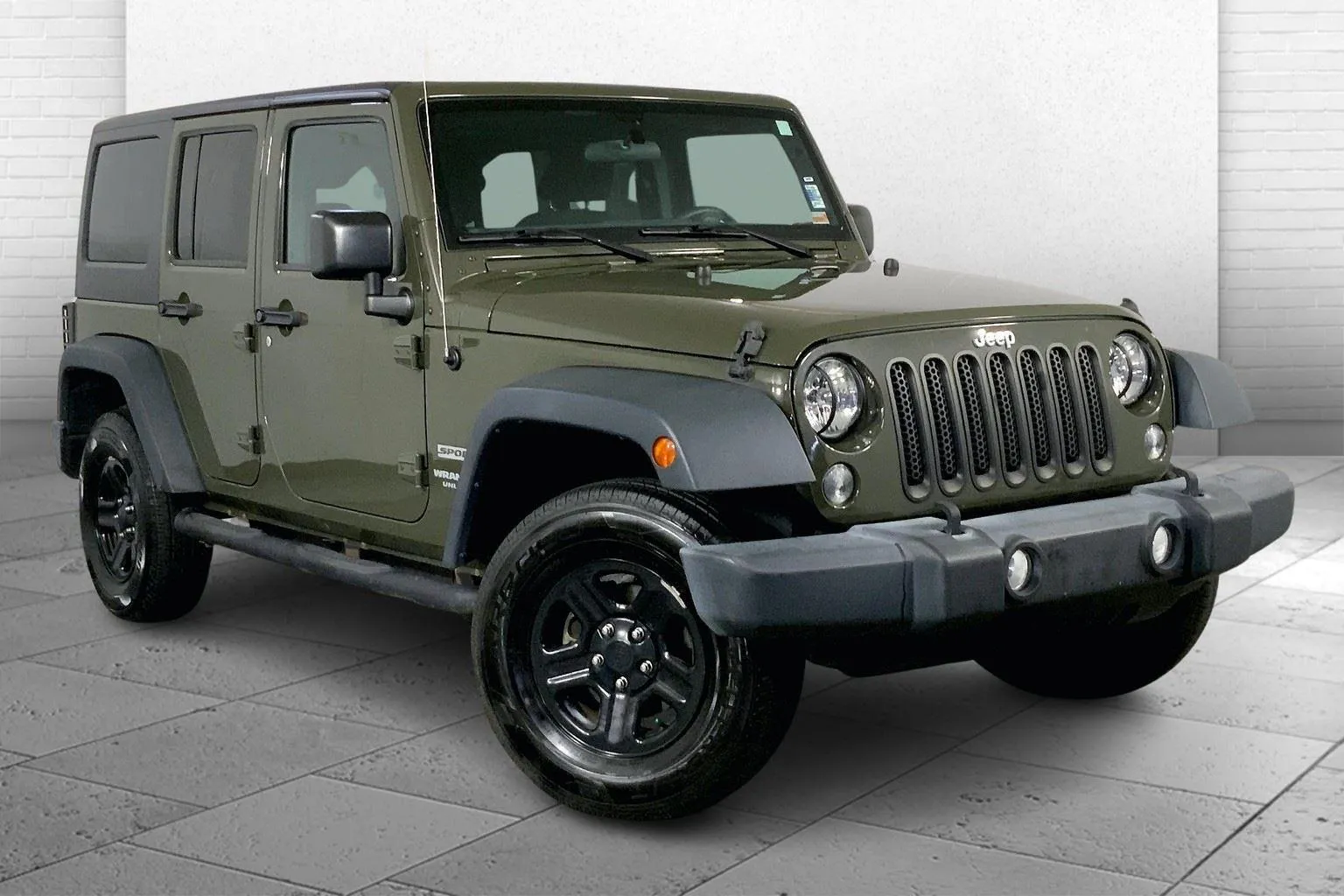 Green 2015 Jeep Wrangler Unlimited Sport for sale in Kansas City, MO