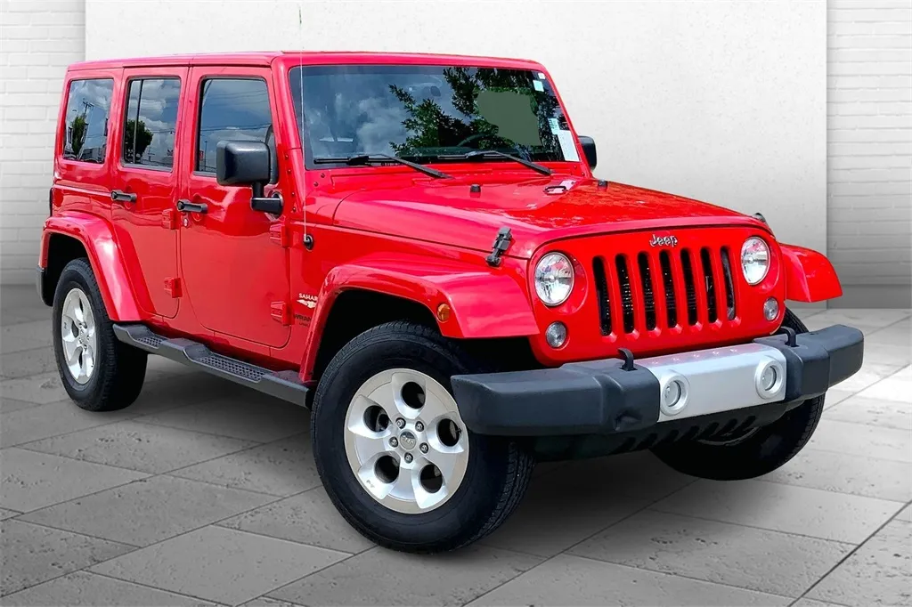 Red 2015 Jeep Wrangler Unlimited Sahara for sale in Kansas City, MO