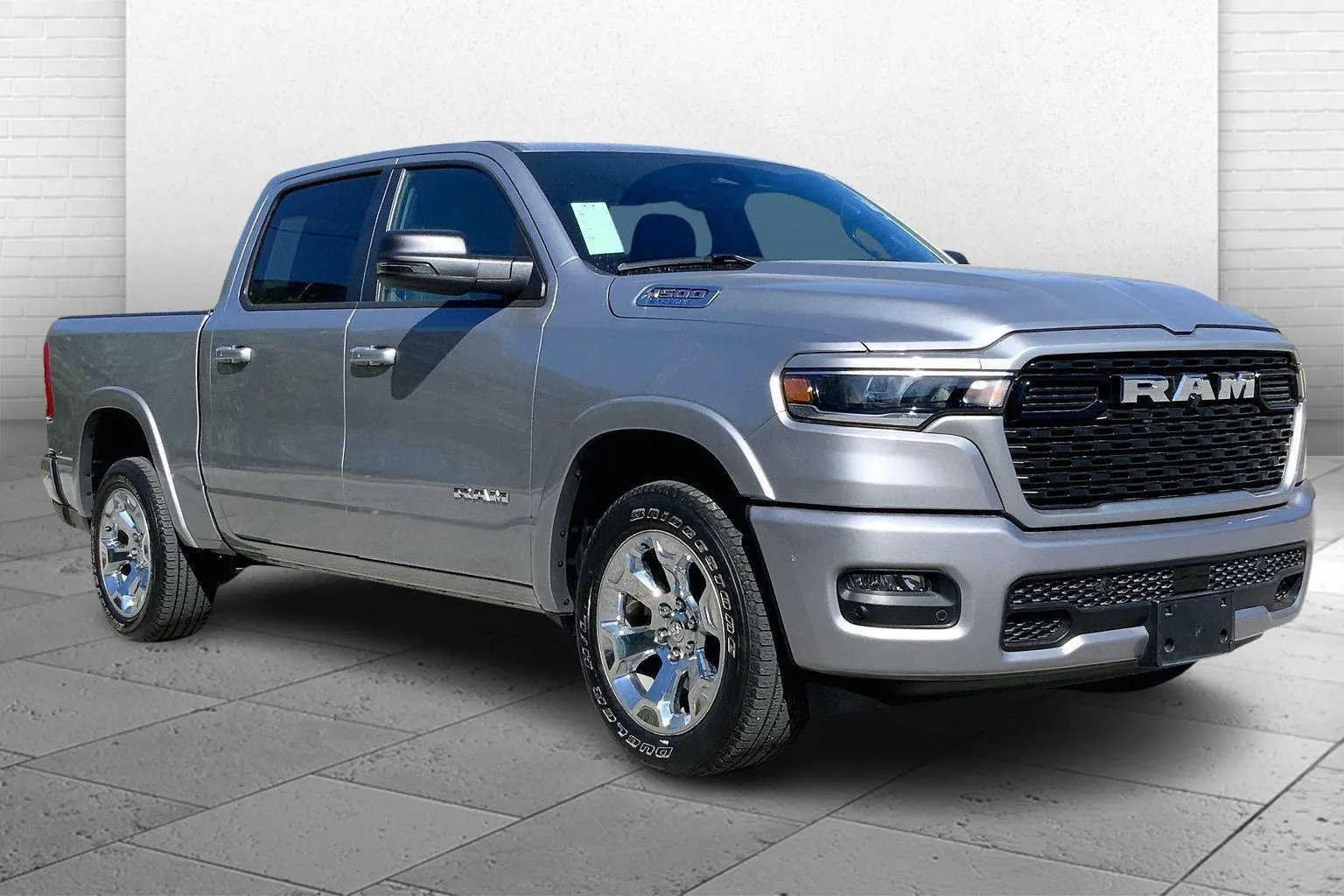 Silver 2025 RAM 1500 Big Horn Crew Cab 4x4 5'7' Box for sale in Kansas City, MO