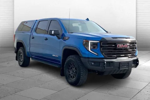 Blue 2023 GMC Sierra 1500 4WD Crew Cab Short Box AT4X for sale in Kansas City, MO