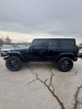 Photos of 2014 Jeep Wrangler Unlimited Rubicon for sale in Lee's Summit, MO at Cable Dahmer Kia of Lee's Summit